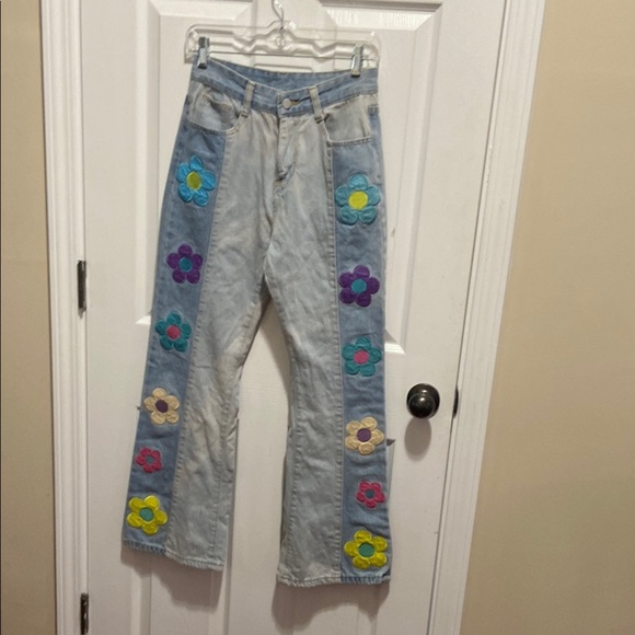 Blue Flare Jeans with Colorful Floral Accents - Picture 2 of 8